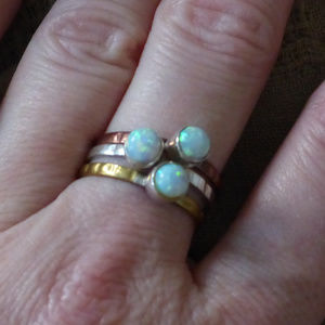 Artisan crafted ring featuring 3 opal bands